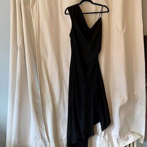 Black satin one shoulder evening dress with asymmetrical hem and front slit